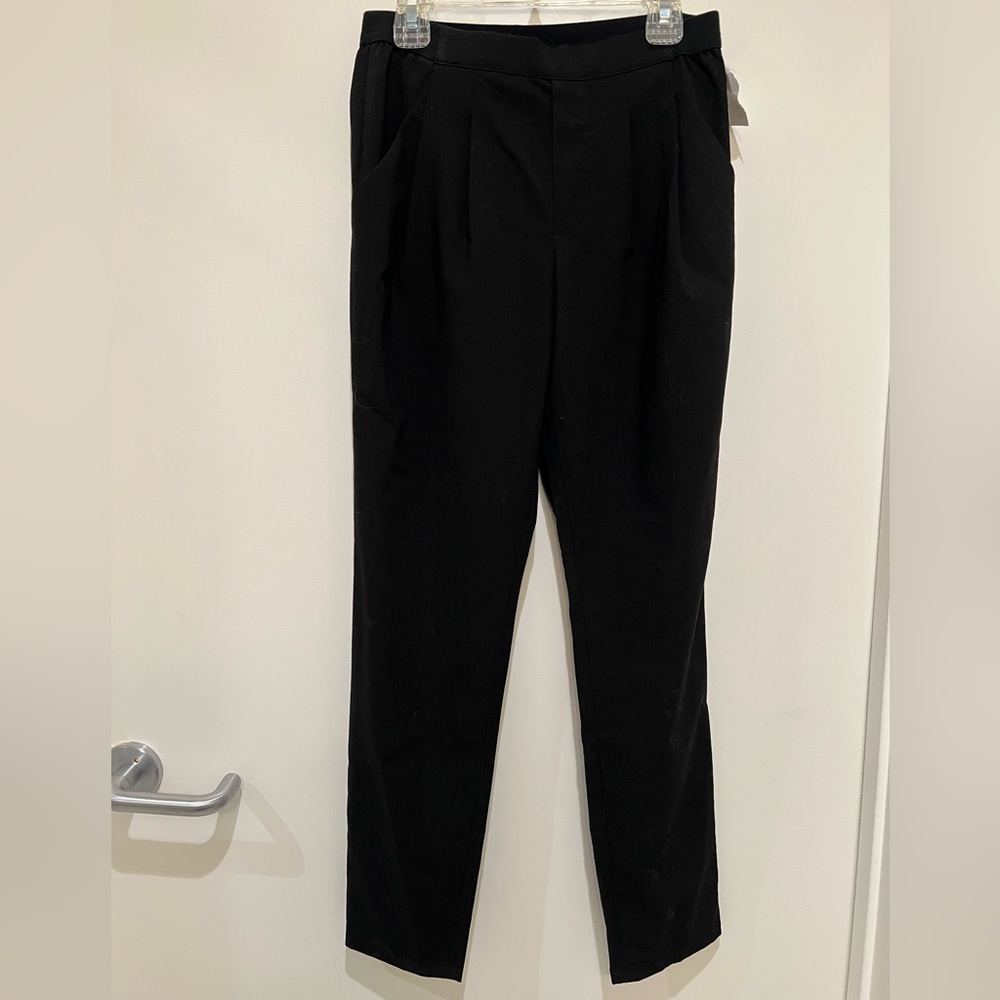 Uniqlo: Black slacks pants.